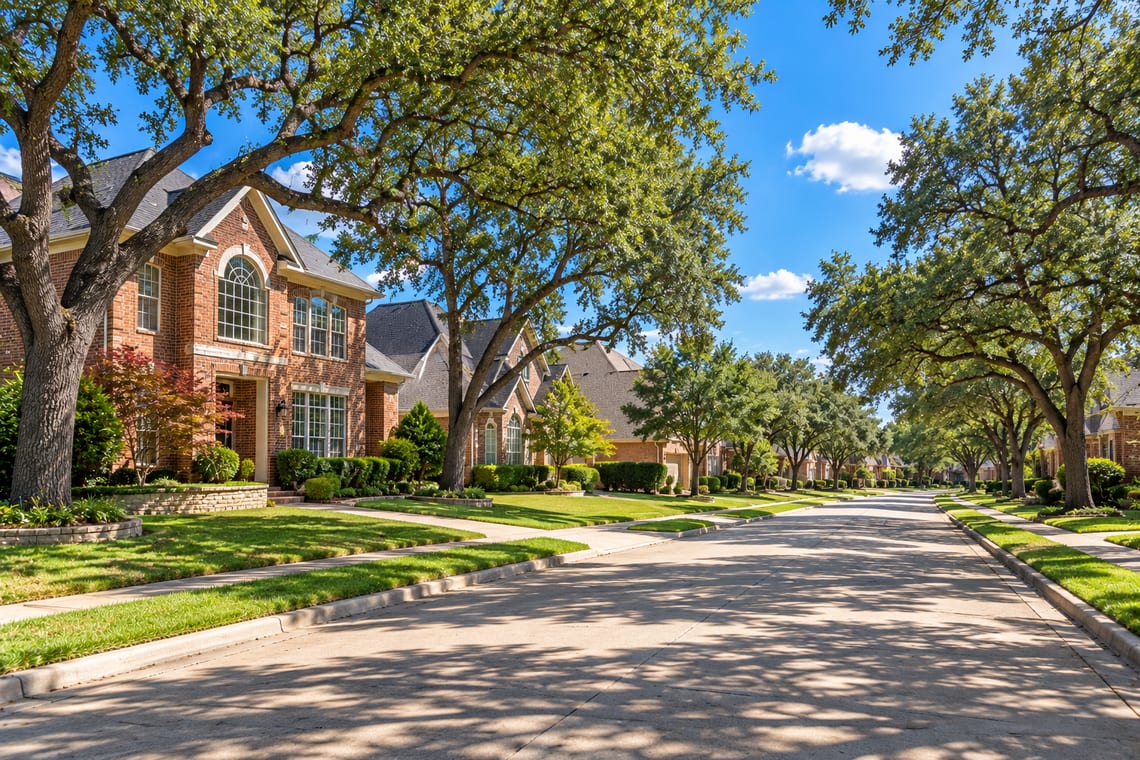 An established suburban street of mature red-brick homes
